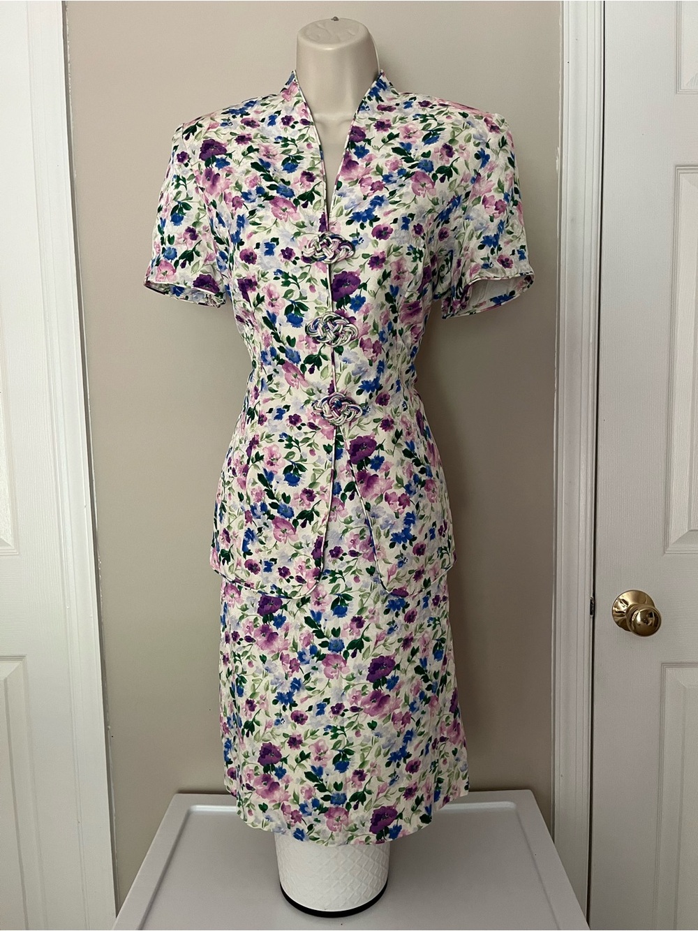 Maggie London 100% silk floral print dress with purple, blue, and green flowers.